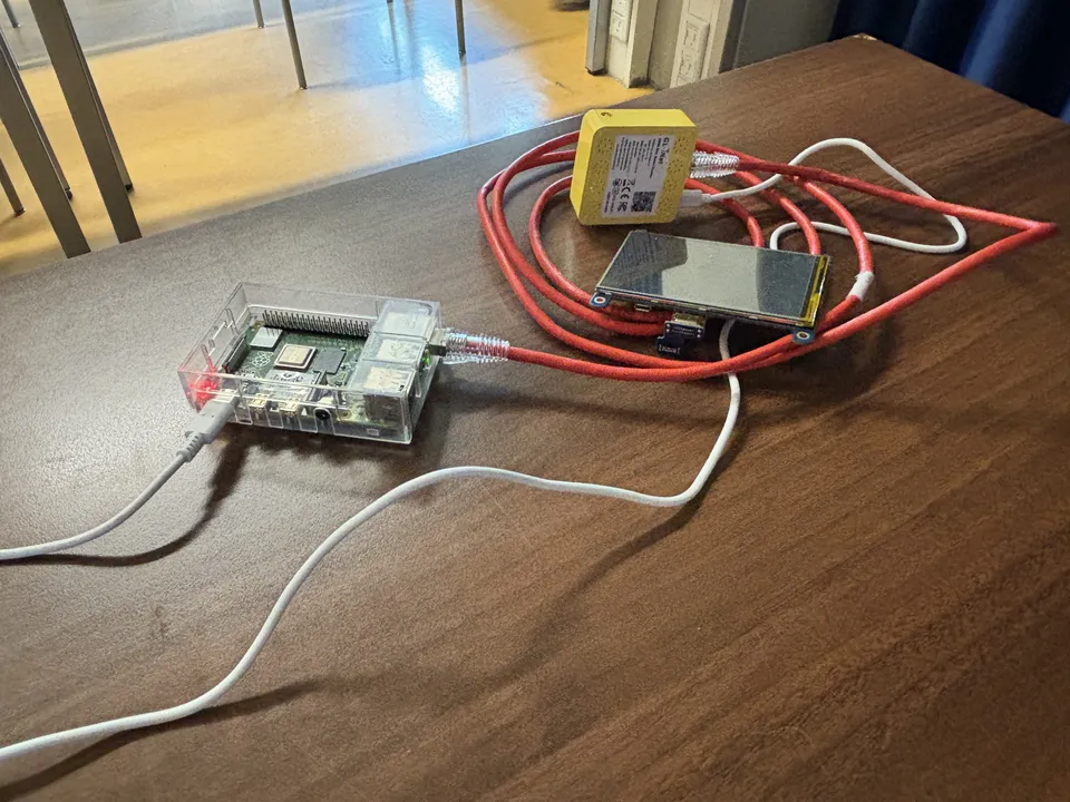 The Servpub server sat on a table with wires and cables in bundles and connected to the portable wifi router we used for local network connection.